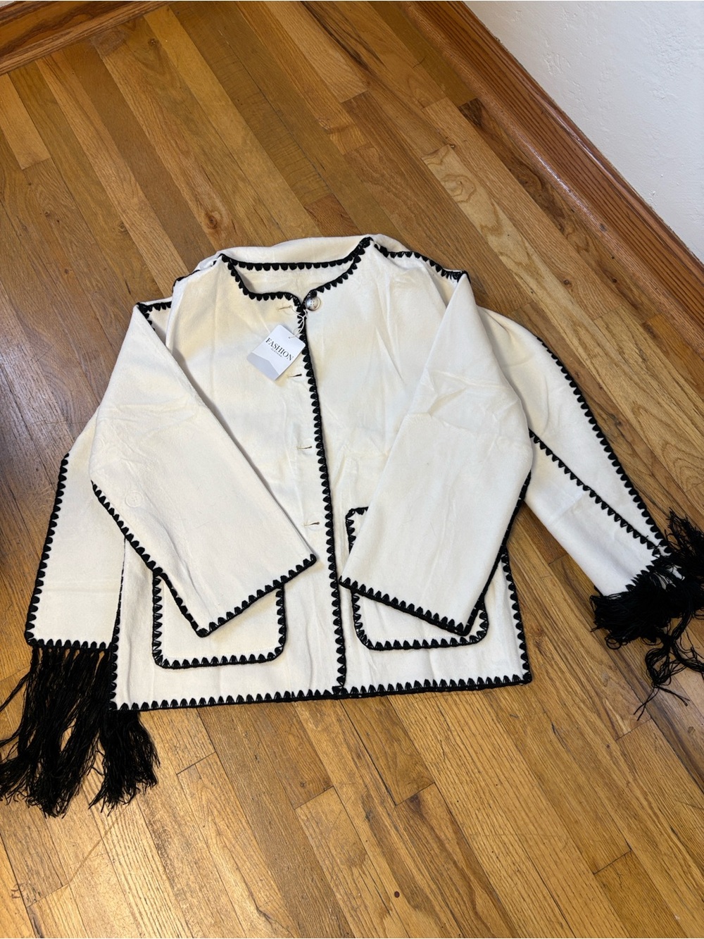 Amazon Cream Jacket with Black Trim and Fringe